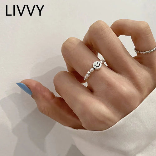 Adjustable Emerald Cut Pearl Stone Ring with silver-plated band and smiley face charm, ideal for casual wear and gifting in jewelry collections.