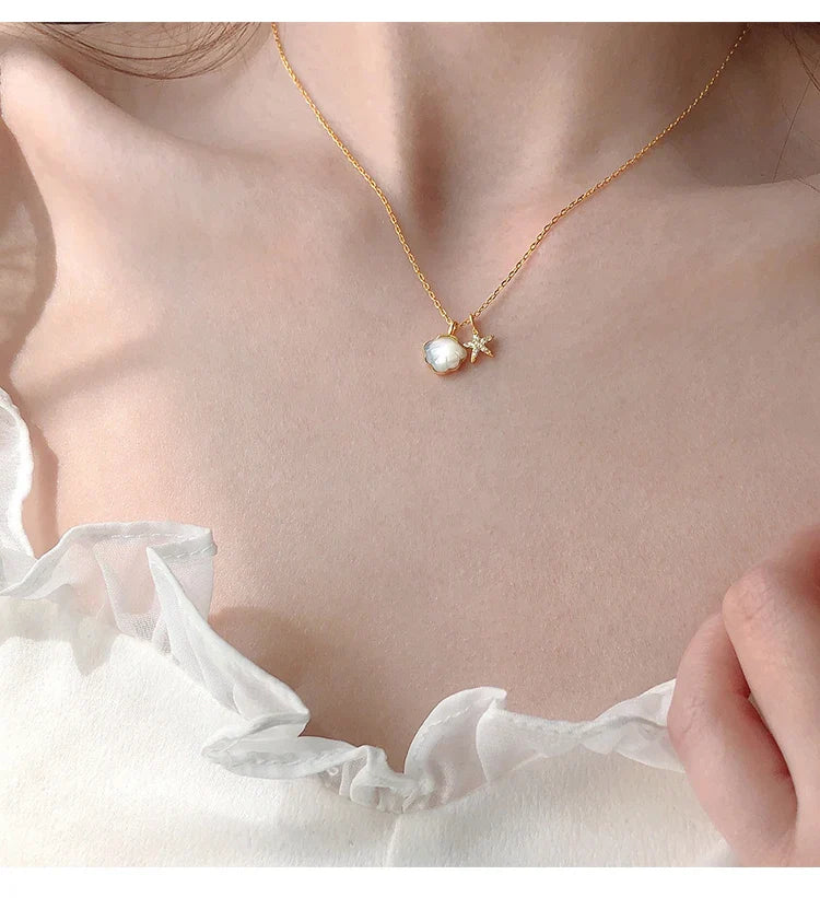 coastal charm necklace close-up pendant