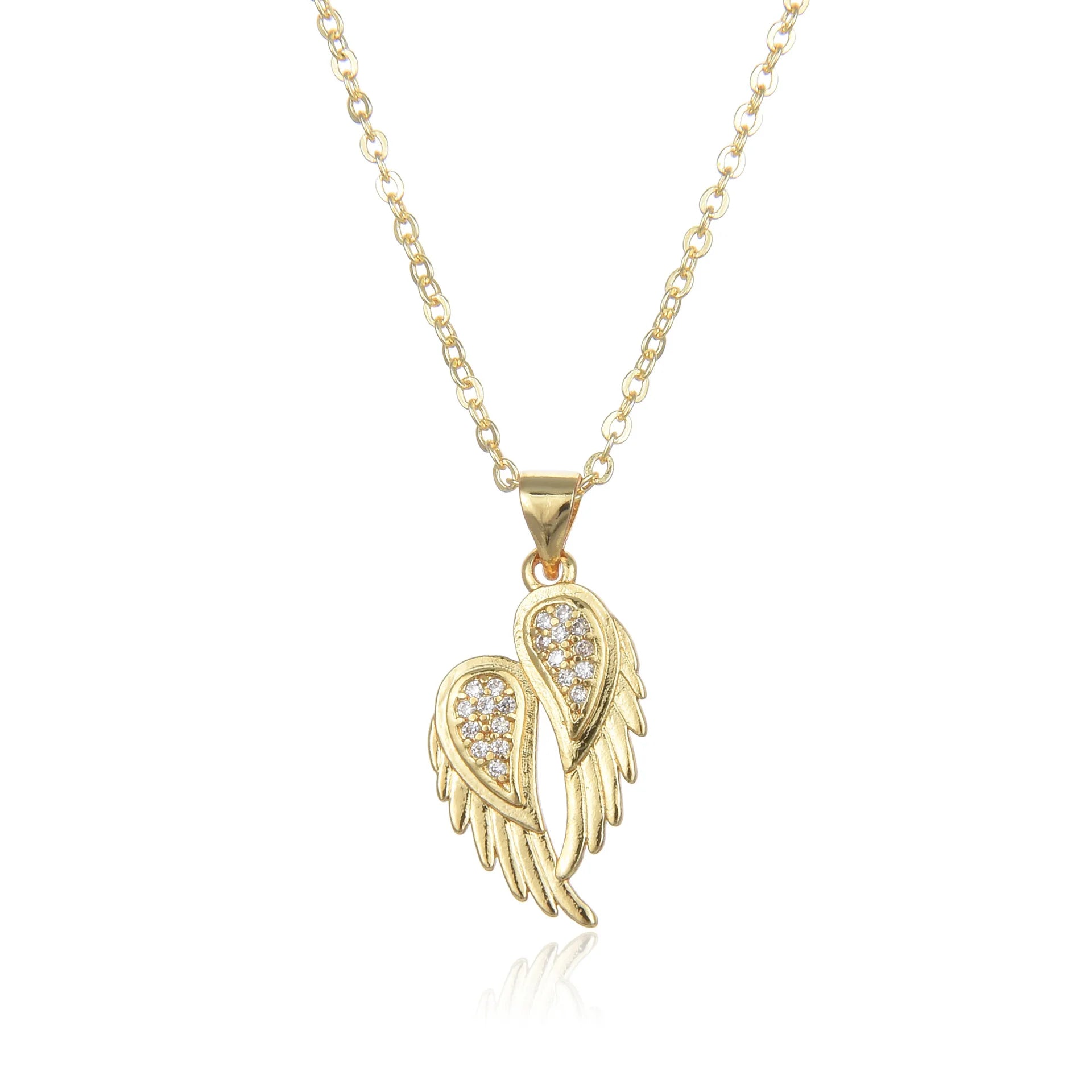 Winged Zircon Pendant Necklace in gold and silver featuring angel wing design with sparkling zircon stones, perfect for women’s elegant jewelry.