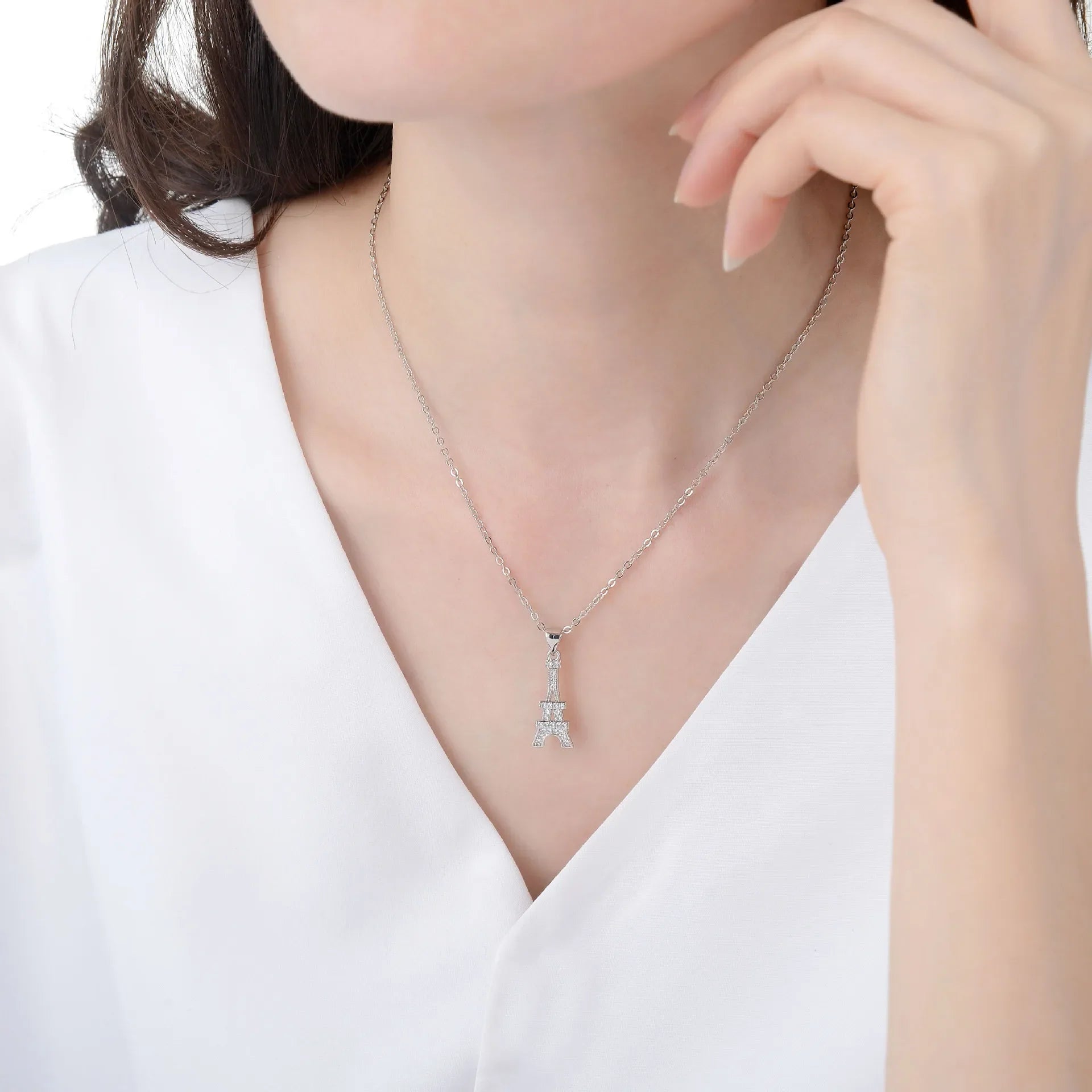 Eiffel Tower Pendant Necklace in gold and silver with crystal accents, an elegant Paris charm necklace for women in jewelry accessories.