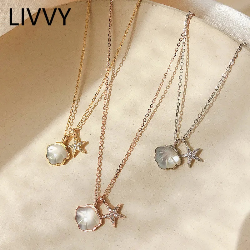 coastal charm necklace close-up pendant