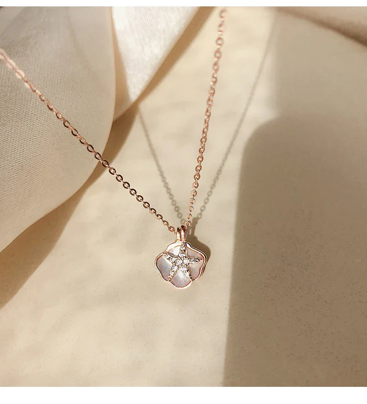 coastal charm necklace close-up pendant