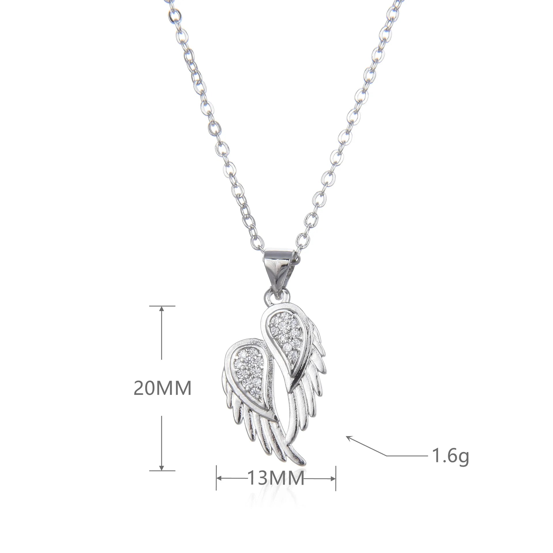 Winged Zircon Pendant Necklace in gold and silver featuring angel wing design with sparkling zircon stones, perfect for women’s elegant jewelry.