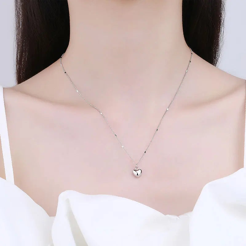 Minimalist heart necklace for women on silver chain