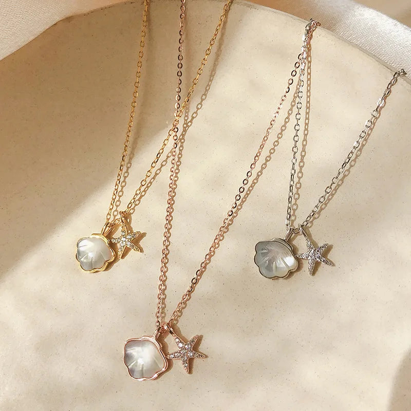 coastal charm necklace close-up pendant