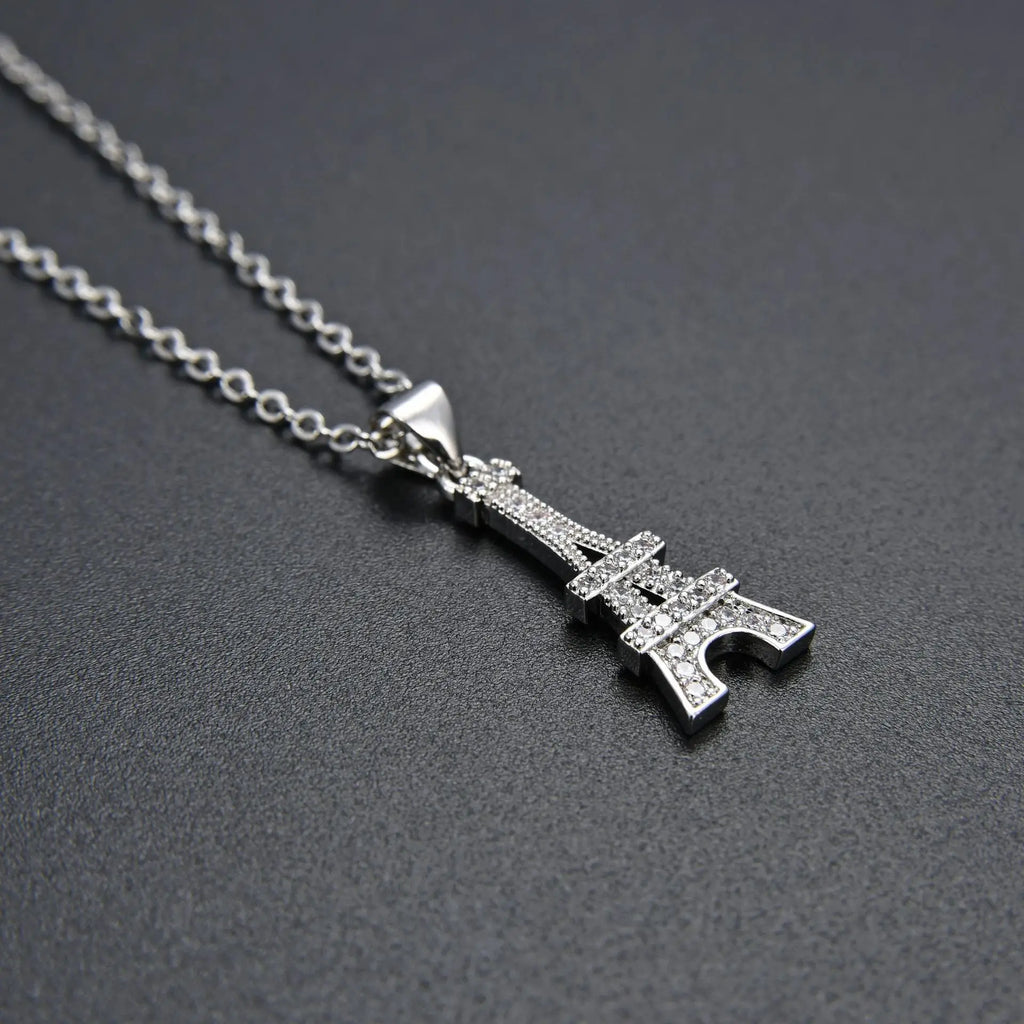 Eiffel Tower Pendant Necklace in gold and silver with crystal accents, an elegant Paris charm necklace for women in jewelry accessories.