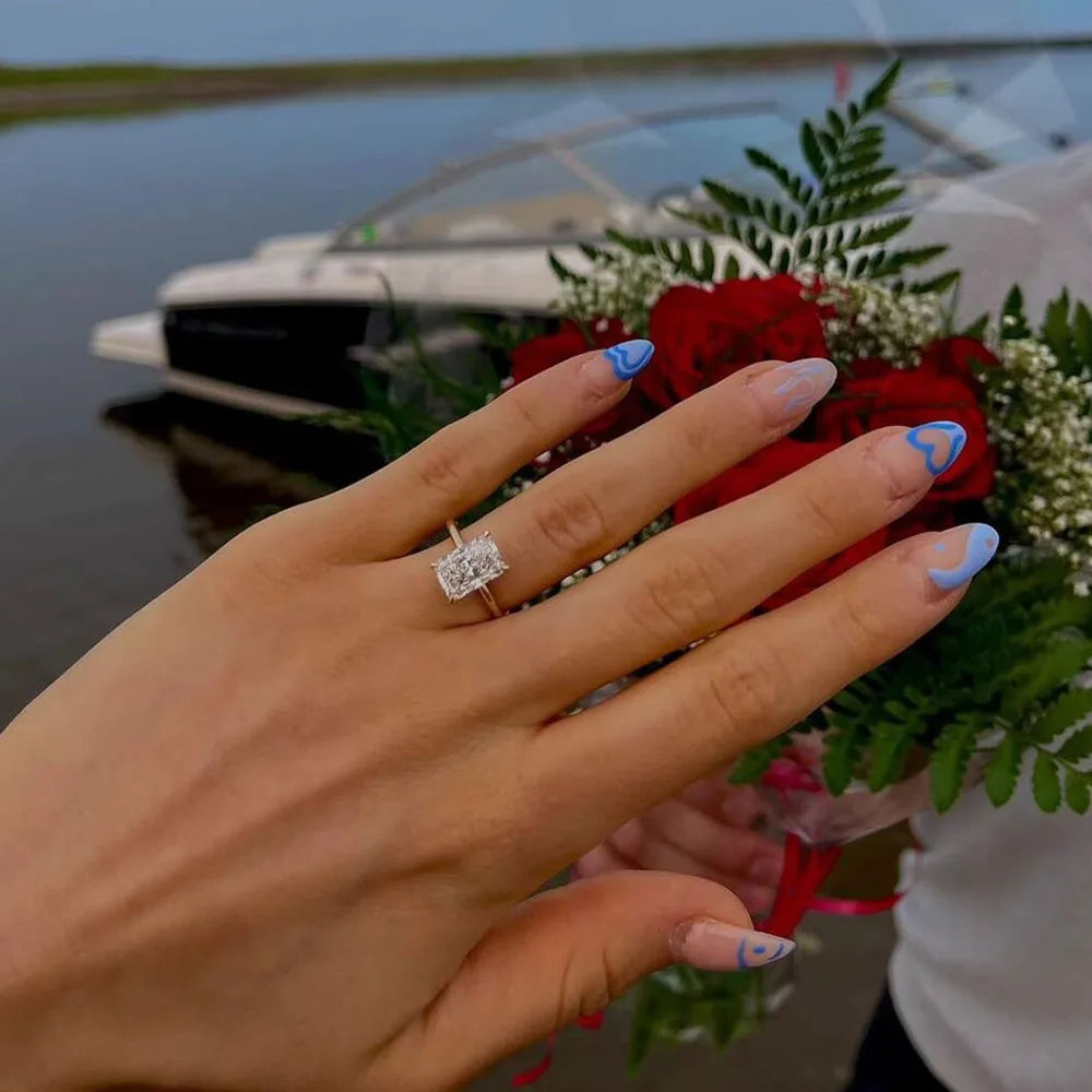 Radiant IGI Certified Diamond Ring in yellow gold setting, luxury engagement and bridal jewelry for weddings and special occasions.