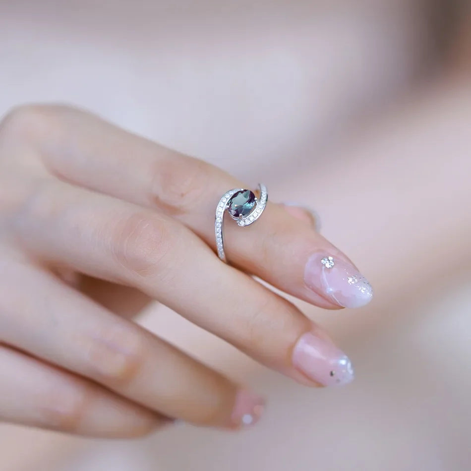 ALLNOEL Alexandrite Ring - Unique Engagement Band in sterling silver featuring color-changing Alexandrite stones in various elegant designs.