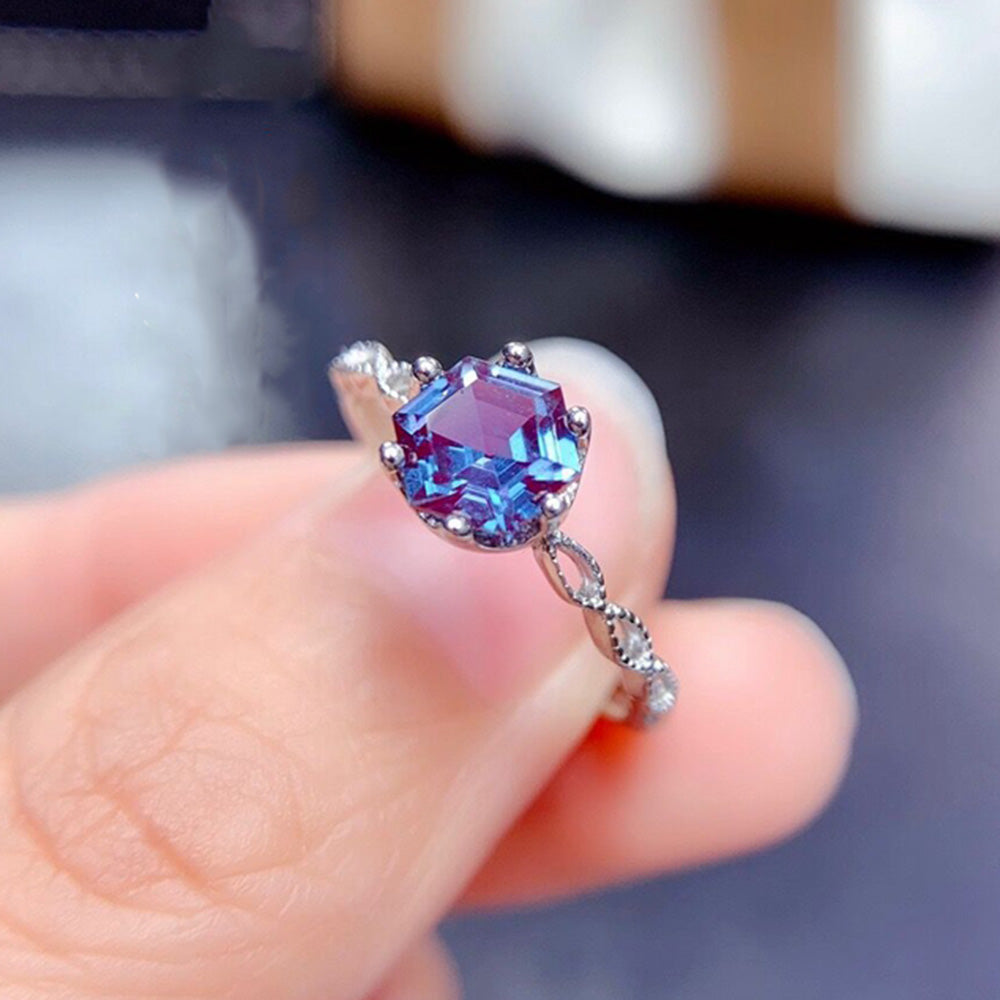 Alexandrite Sterling Silver Ring featuring a 6mm hexagon-cut gemstone in a prong setting. Elegant 925 silver band ideal for engagement occasions.