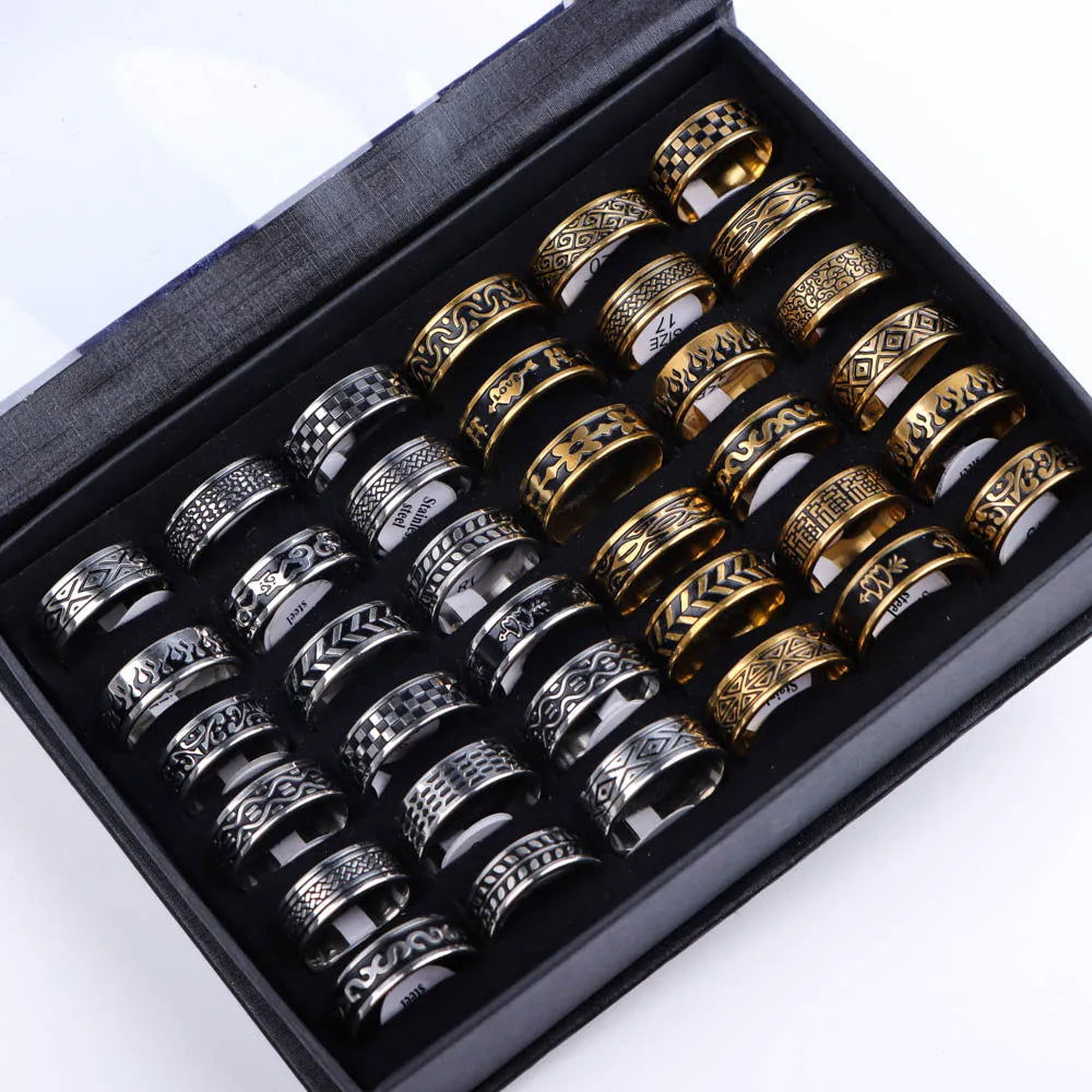 Retro vintage rings in stainless steel with black and gold finishes, ideal for wedding and bridal sets. Includes engraved and patterned designs.