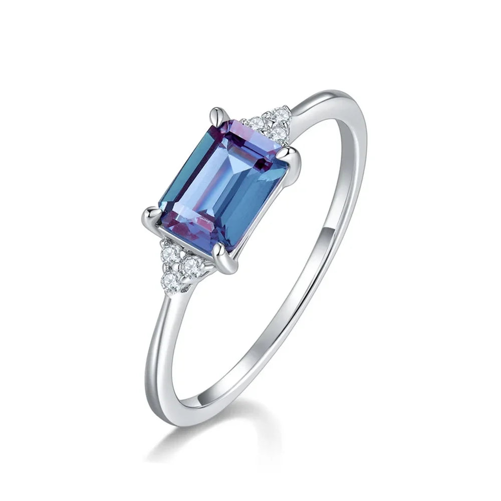 ALLNOEL Alexandrite Ring - Unique Engagement Band in sterling silver featuring color-changing Alexandrite stones in various elegant designs.