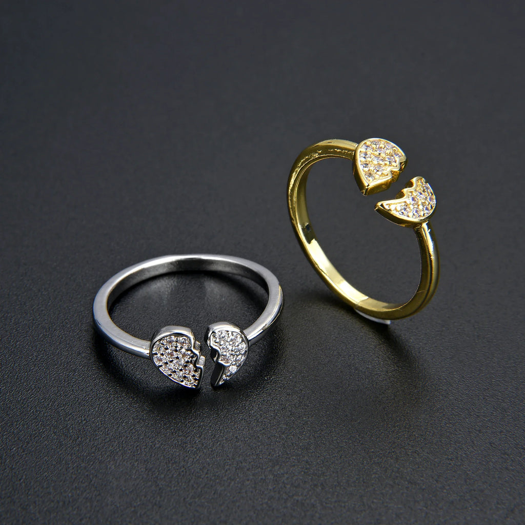 Minimalist heart ring in gold and silver with broken heart design, adjustable and adorned with crystals. Ideal for women’s fashion jewelry.