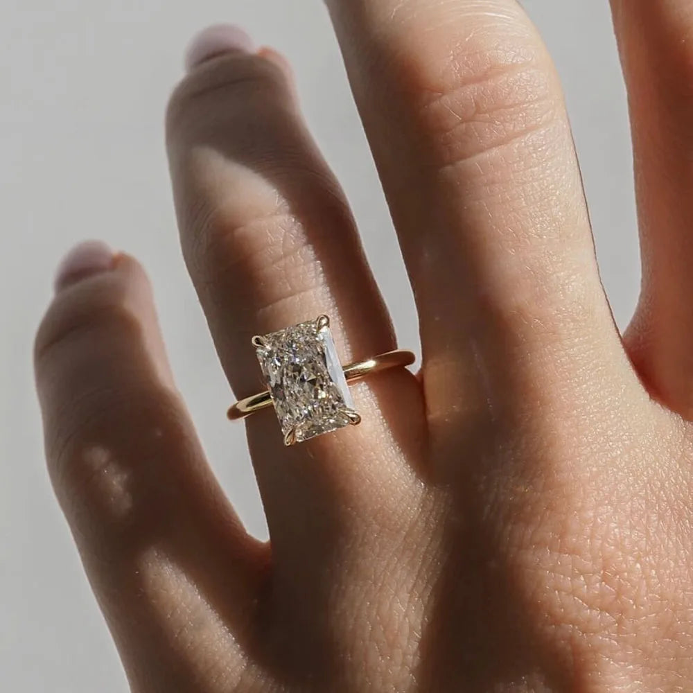 Radiant IGI Certified Diamond Ring in yellow gold setting, luxury engagement and bridal jewelry for weddings and special occasions.