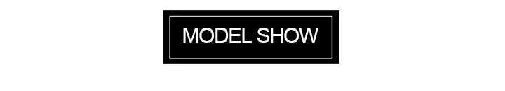 Elegant Silver Wedding Ring with round-cut Tanzanite Zircon on hand, showcasing fine jewelry craftsmanship for engagements or weddings.