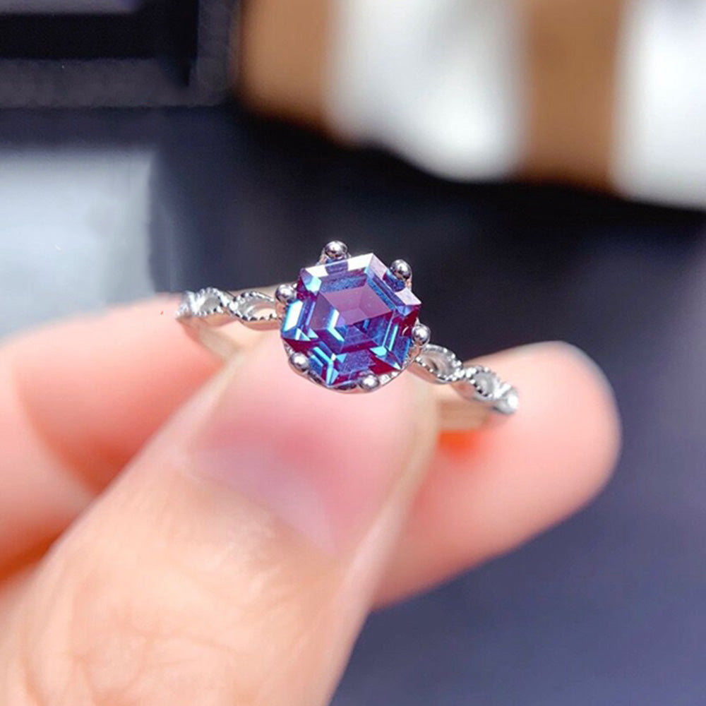 Alexandrite Sterling Silver Ring featuring a 6mm hexagon-cut gemstone in a prong setting. Elegant 925 silver band ideal for engagement occasions.