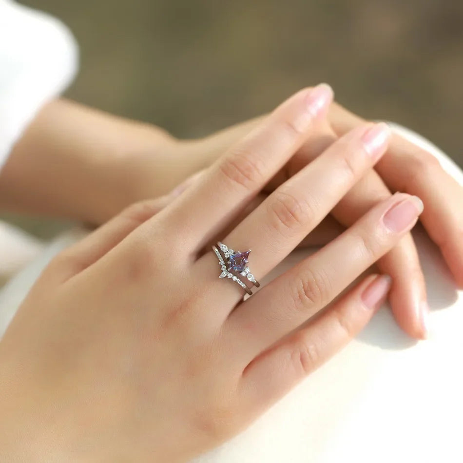 ALLNOEL Alexandrite Ring - Unique Engagement Band in sterling silver featuring color-changing Alexandrite stones in various elegant designs.