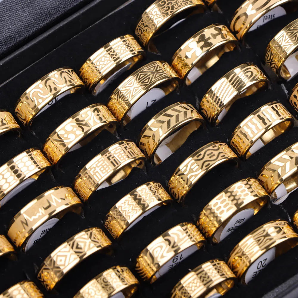 Retro vintage rings in stainless steel with black and gold finishes, ideal for wedding and bridal sets. Includes engraved and patterned designs.