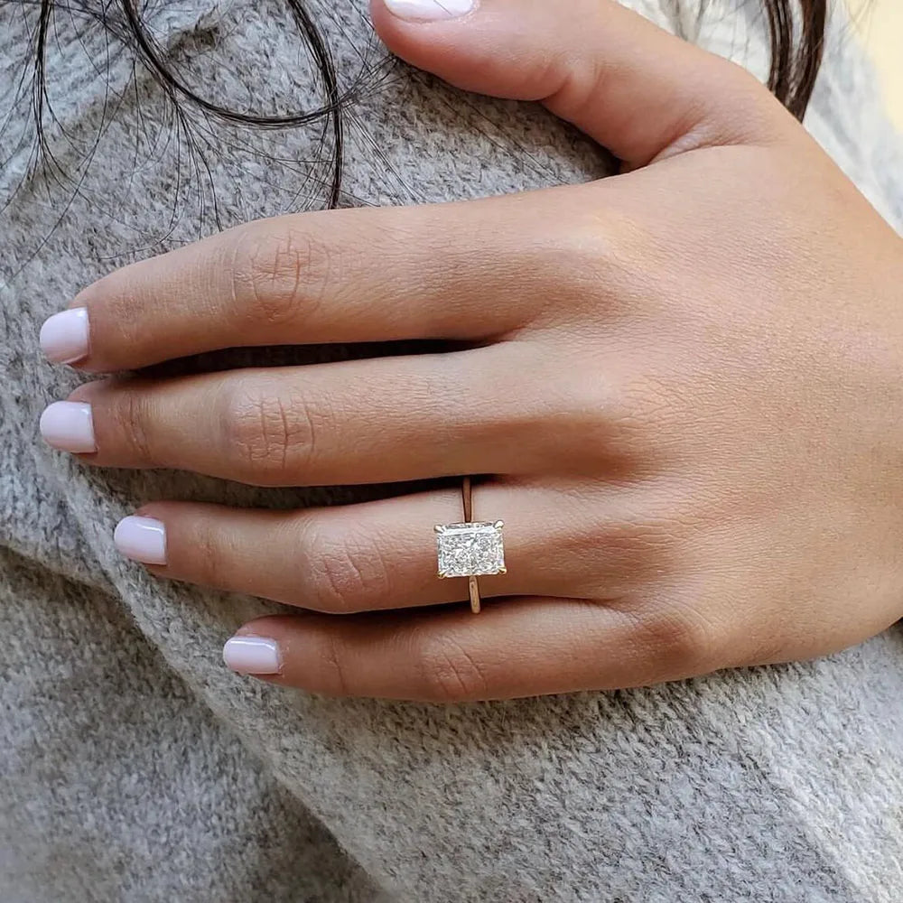 Radiant IGI Certified Diamond Ring in yellow gold setting, luxury engagement and bridal jewelry for weddings and special occasions.