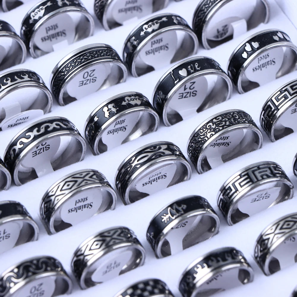 Retro vintage rings in stainless steel with engraved patterns, ideal for wedding and bridal sets. Includes men's engagement and wedding bands.
