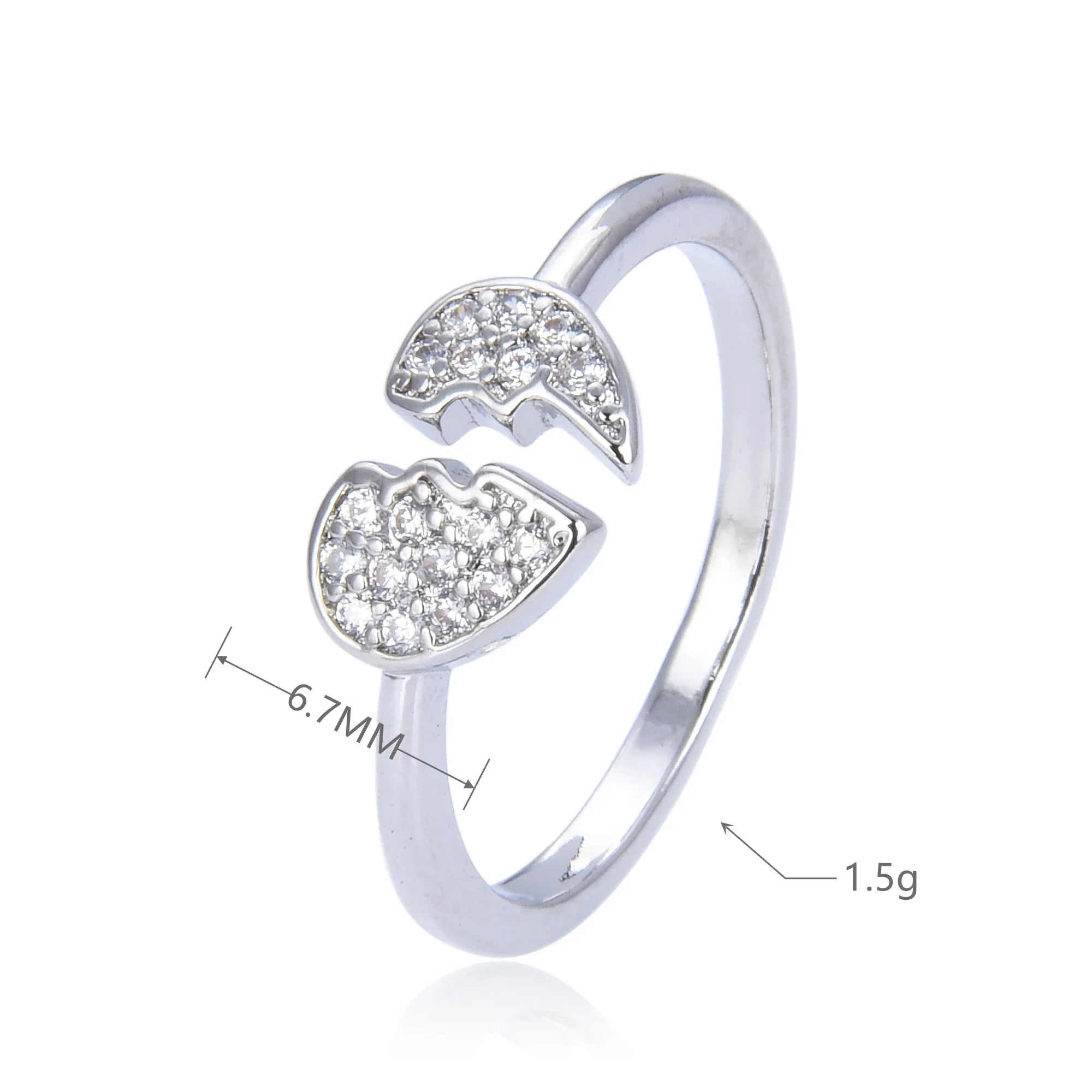 Minimalist heart ring in gold and silver with broken heart design, adjustable and adorned with crystals. Ideal for women’s fashion jewelry.